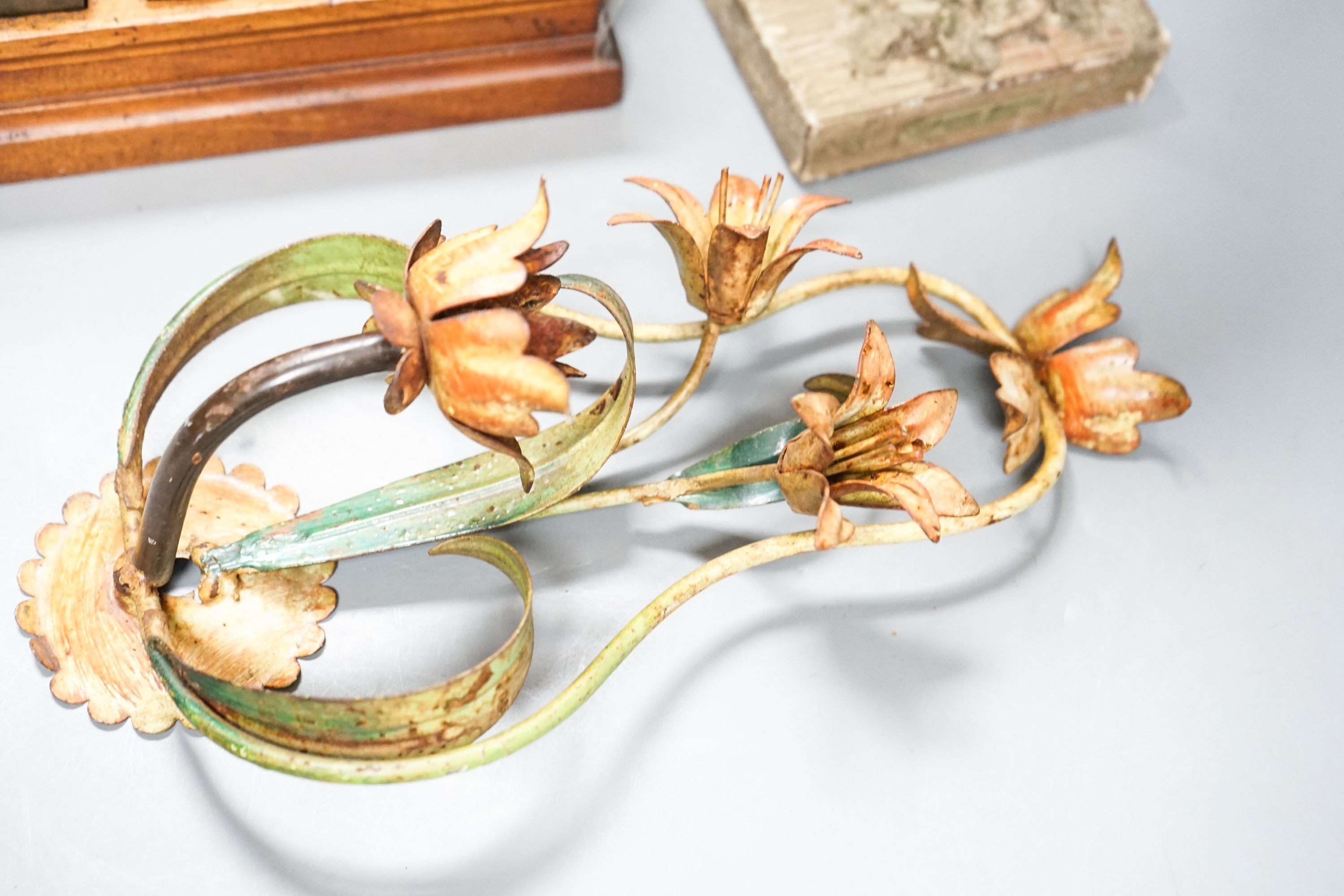 A Ratcliff weighing scale, a painted wrought iron floral wall light, a model of a stork, 33cm